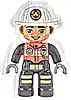 Minifigurka LEGO® 47394pb332 Duplo Figure Lego Ville, Male Firefighter, Black Legs with Reflective Stripes, Red Vest with Silver Fire Badge and Radio, Medium Nougat Face, White Helmet with Fire Badge (6373860)